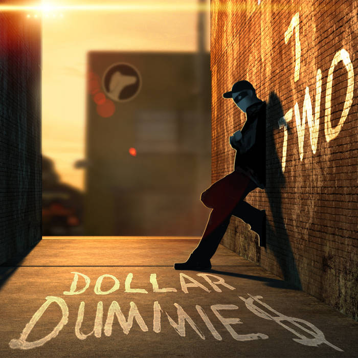 Young man with dark hair and beard, brown eyes, blue t-shirt